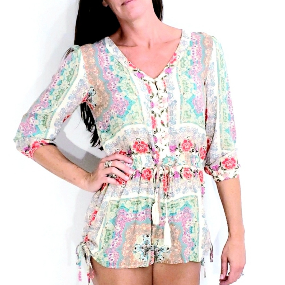 Anthropologie En Creme Floral LS Romper  Small